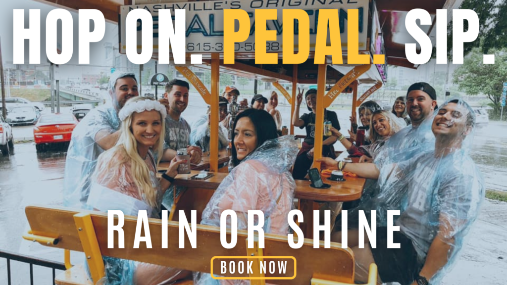 people wearing rain ponchos while on a nashville pedal tavern ride on a rainy day in nashville